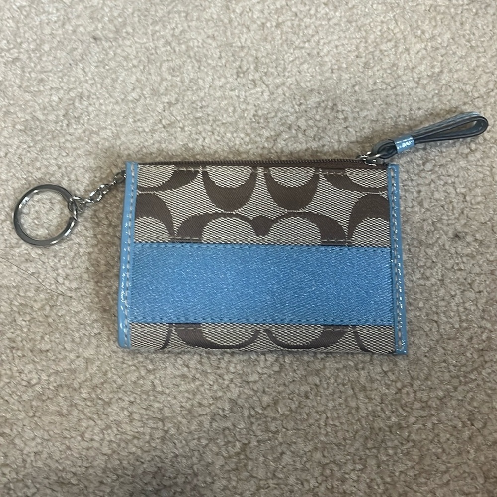 Tan and blue Coach coin purse